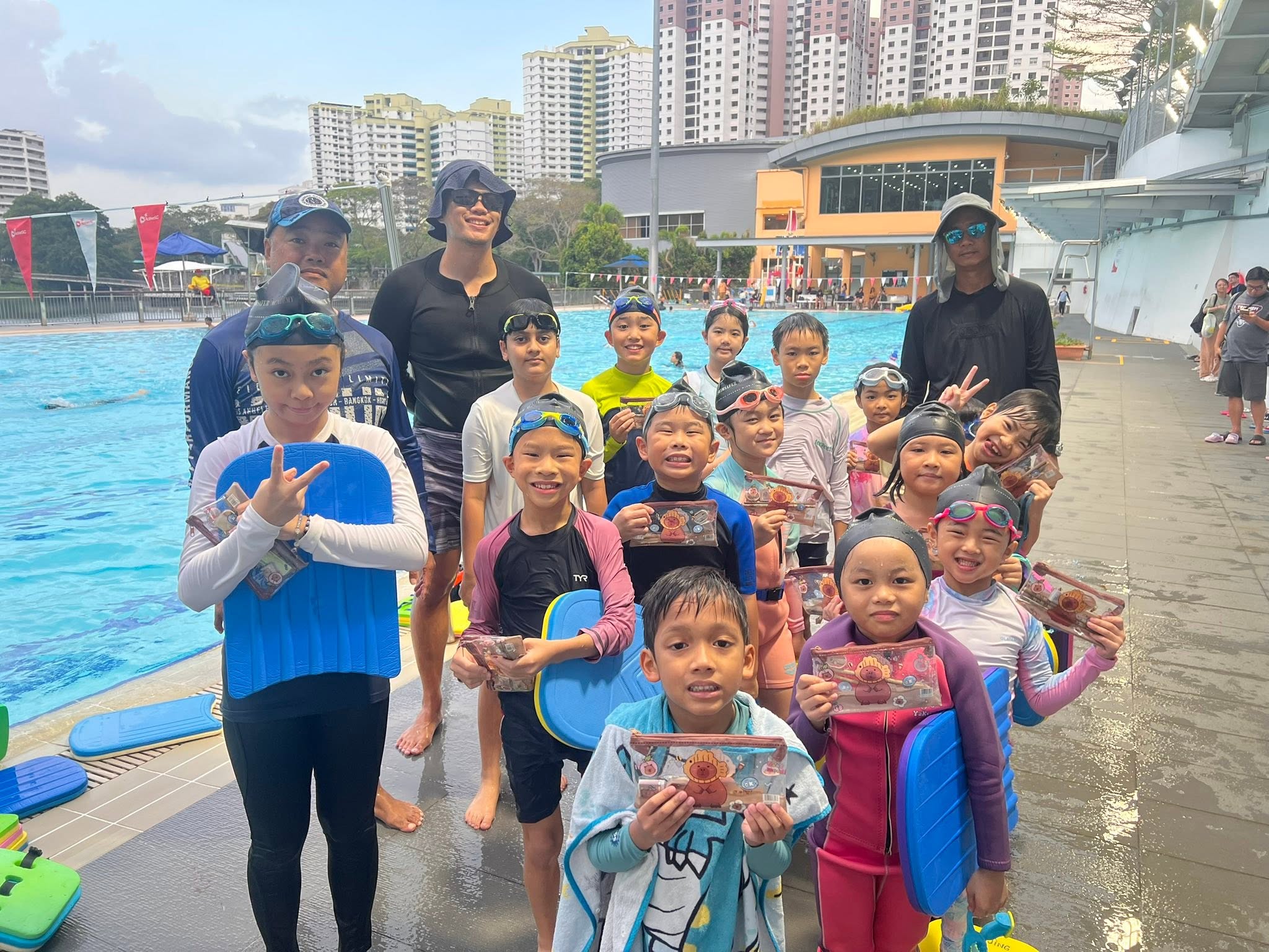 Children learning together in the pool