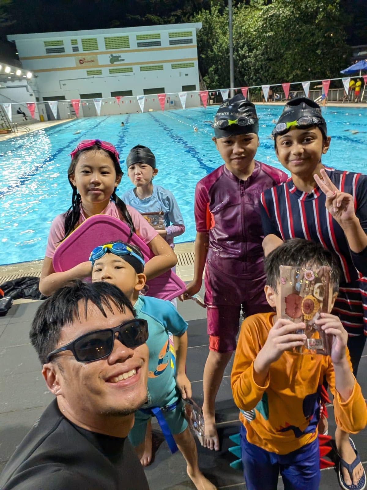 Young swimmers practising in the pool
