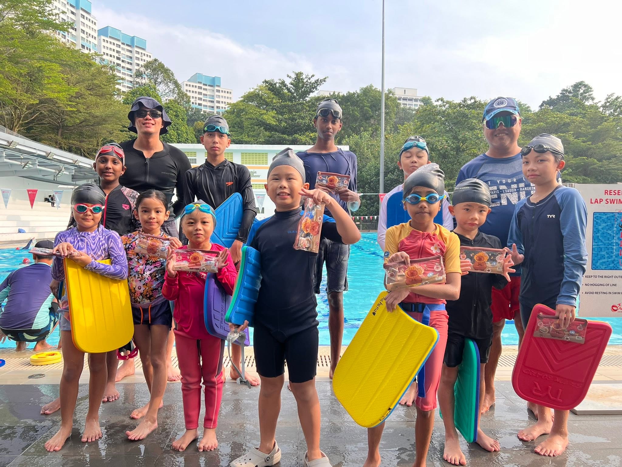 Children taking part in a group swim class